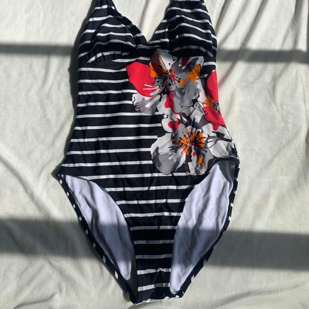 One piece swimsuit. A bit of a lower back.